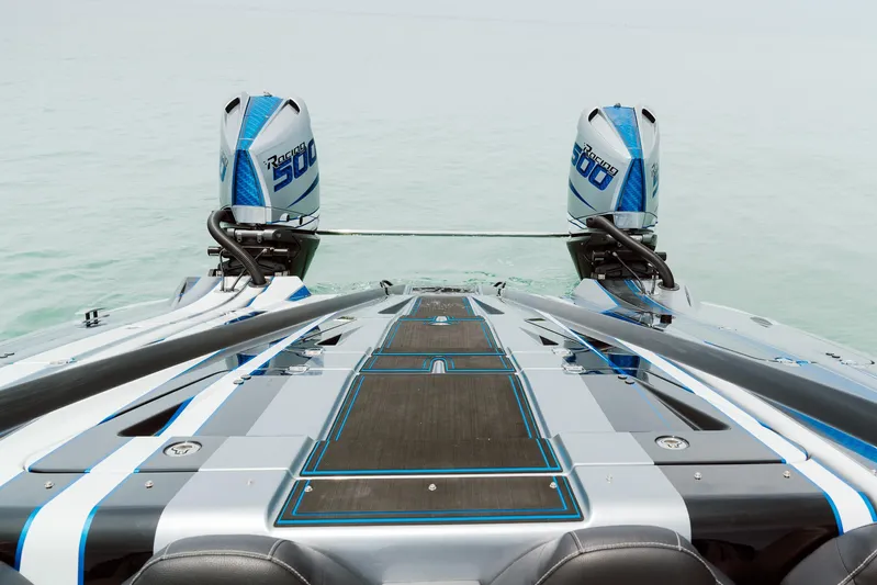  Yacht Photos Pics 2024 MTI 440X boat with dual powerful engines on calm water.