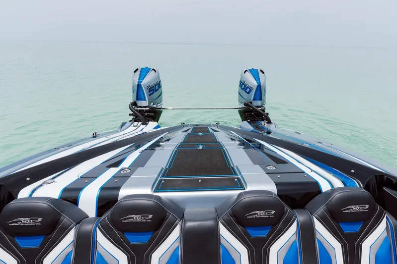  Yacht Photos Pics 2024 MTI 440X powerboat with dual engines on calm water.