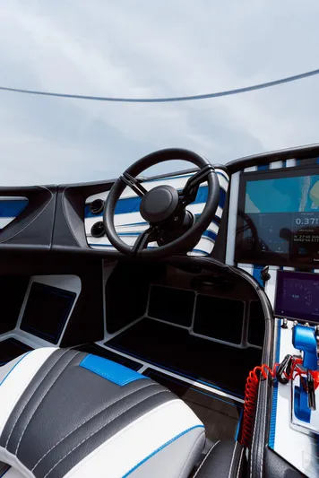  Yacht Photos Pics 2024 MTI 440X boat interior with steering wheel and modern dashboard.