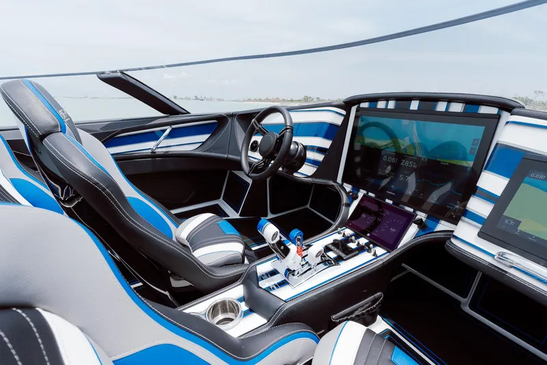  Yacht Photos Pics 2024 MTI 440X boat interior with modern dashboard and blue accents.