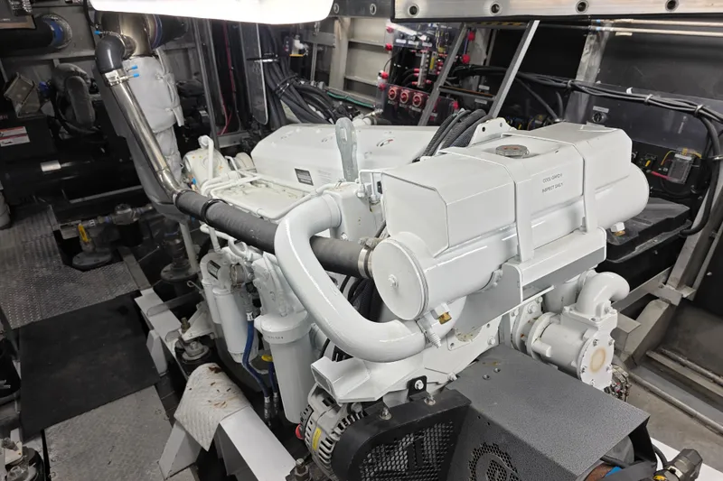 Ocean Thunder Yacht Photos Pics Engine room of 1986 Gulf Craft Passenger boat, featuring a well-maintained marine engine.