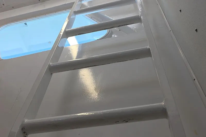 Ocean Thunder Yacht Photos Pics White ladder inside 1986 Gulf Craft Passenger boat, with window view.