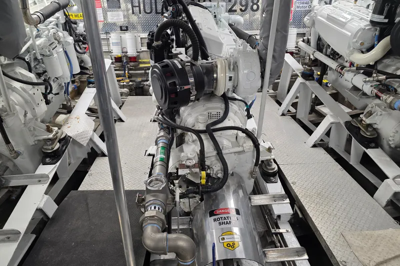 Ocean Thunder Yacht Photos Pics Engine room of a 1986 Gulf Craft Passenger vessel, showcasing machinery and components.