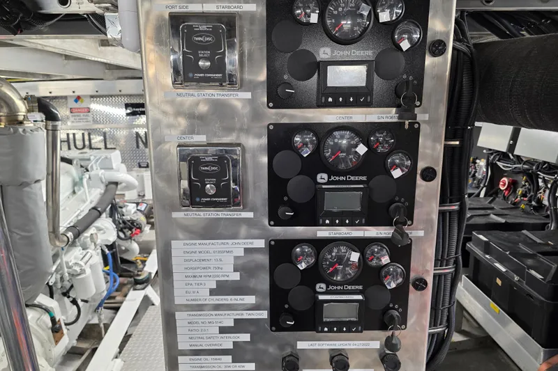 Ocean Thunder Yacht Photos Pics Engine room of 1986 Gulf Craft Passenger boat with John Deere control panels.