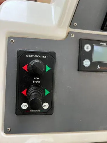  Yacht Photos Pics Control panel with Side-Power thruster controls in a 2018 Bavaria E34 Sedan.