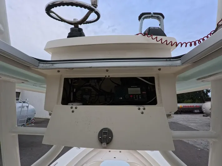  Yacht Photos Pics 2019 Young Boats 27 console with steering wheel and control panel.