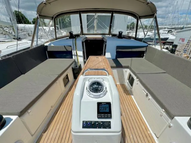 Jessy Yacht Photos Pics 2023 Jeanneau Sun Odyssey 490 cockpit with modern navigation equipment and comfortable seating.