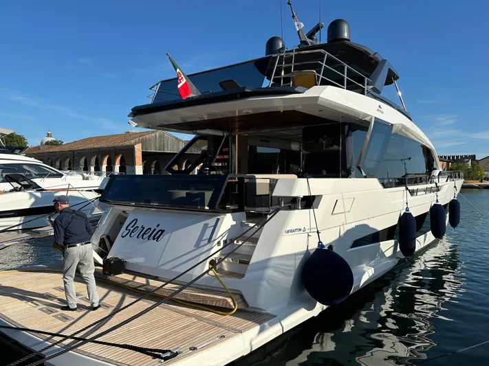  Yacht Photos Pics 2025 Astondoa AS 8 yacht docked, featuring sleek design and modern amenities.