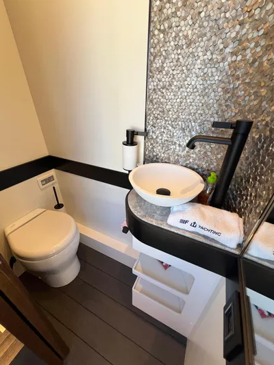  Yacht Photos Pics Luxury bathroom in 2025 Astondoa AS 8 yacht with modern fixtures and elegant design.