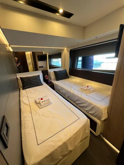  Yacht Photos Pics Luxurious twin cabin in 2025 Astondoa AS 8 yacht, featuring modern design and elegant bedding.