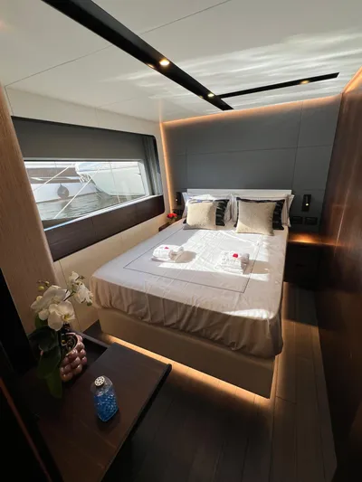  Yacht Photos Pics Luxurious bedroom interior of 2025 Astondoa AS 8 yacht with modern design and elegant lighting.