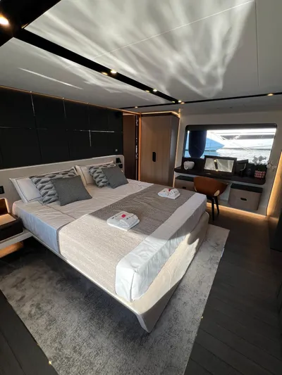  Yacht Photos Pics Luxurious bedroom interior of 2025 Astondoa AS 8 yacht with modern design and elegant furnishings.