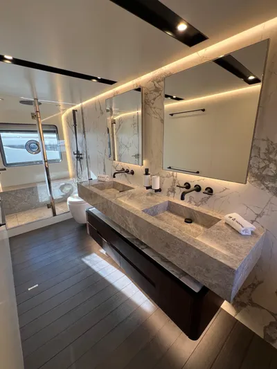  Yacht Photos Pics Luxurious bathroom in 2025 Astondoa AS 8 yacht with dual sinks and modern design.