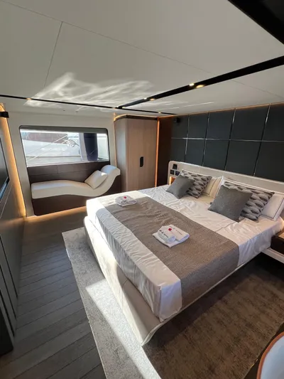  Yacht Photos Pics Luxurious bedroom in 2025 Astondoa AS 8 yacht with modern design and elegant furnishings.