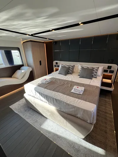  Yacht Photos Pics Luxurious bedroom on 2025 Astondoa AS 8 yacht with modern design and elegant furnishings.