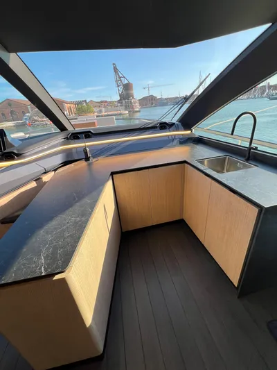  Yacht Photos Pics Luxurious interior of 2025 Astondoa AS 8 yacht with modern kitchen design.