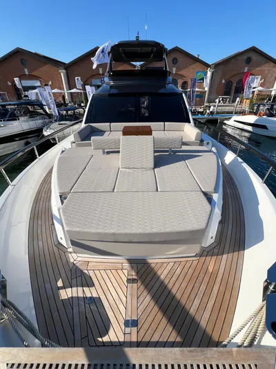  Yacht Photos Pics 2025 Astondoa AS 8 yacht with spacious deck and modern design at a marina.
