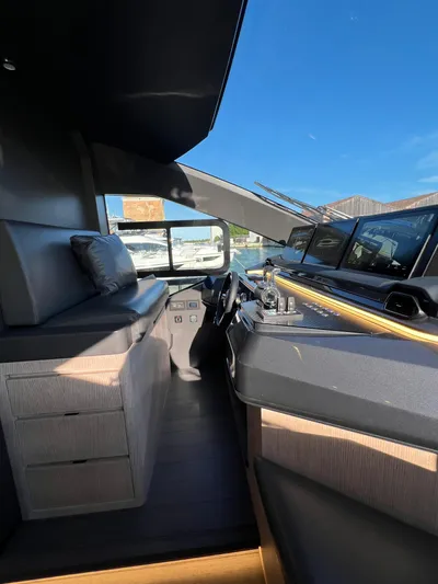  Yacht Photos Pics Interior of 2025 Astondoa AS 8 yacht with modern helm and seating area.