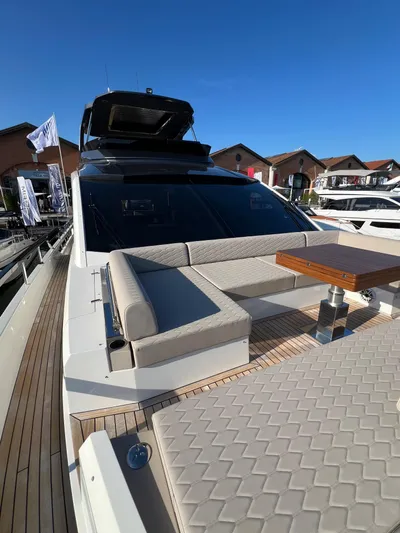  Yacht Photos Pics 2025 Astondoa AS 8 yacht with luxurious deck seating and sleek design.