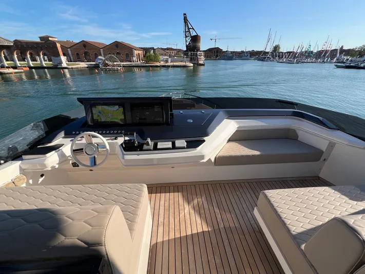  Yacht Photos Pics Luxurious 2025 Astondoa AS 8 yacht interior with modern helm, docked in scenic marina.