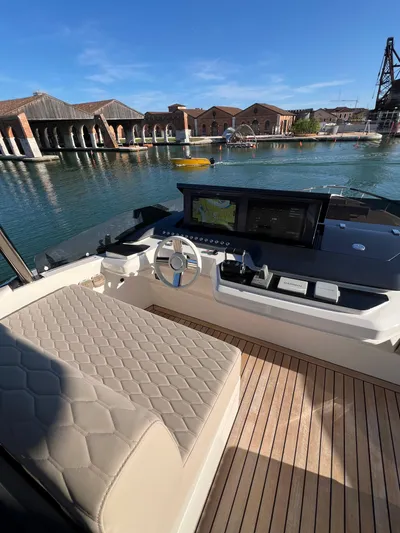  Yacht Photos Pics 2025 Astondoa AS 8 yacht helm with luxurious seating and modern navigation system.