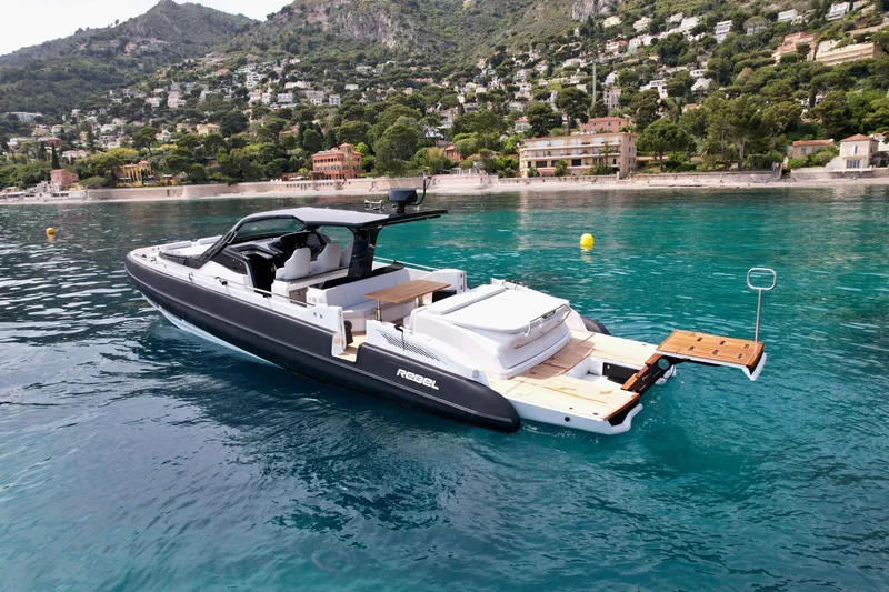 Rebel 47 Yacht Photos Pics 2025 SACS Rebel 47 yacht in scenic coastal waters, featuring sleek design and luxurious amenities.
