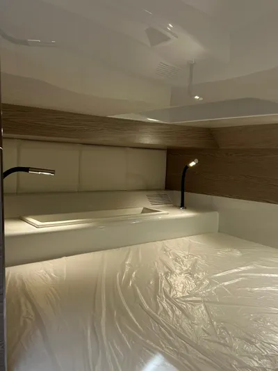 Rebel 47 Yacht Photos Pics 2025 SACS Rebel 47 cabin interior with modern lighting and sleek design.