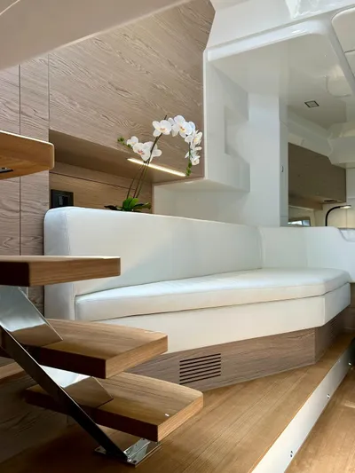 Rebel 47 Yacht Photos Pics Luxurious interior of 2025 SACS Rebel 47 yacht with modern seating and elegant decor.