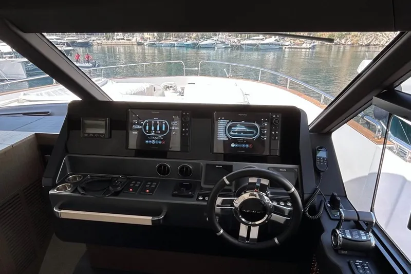  Yacht Photos Pics Cockpit of 2022 Azimut Magellano 66 yacht with advanced navigation systems.