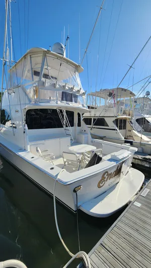 Endurance Yacht Photos Pics 2001 Ocean Yachts 56 Super Sport docked at marina under clear blue sky.