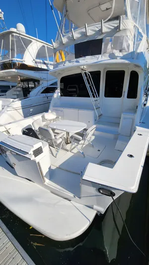 Endurance Yacht Photos Pics 2001 Ocean Yachts 56 Super Sport with spacious deck and seating area.