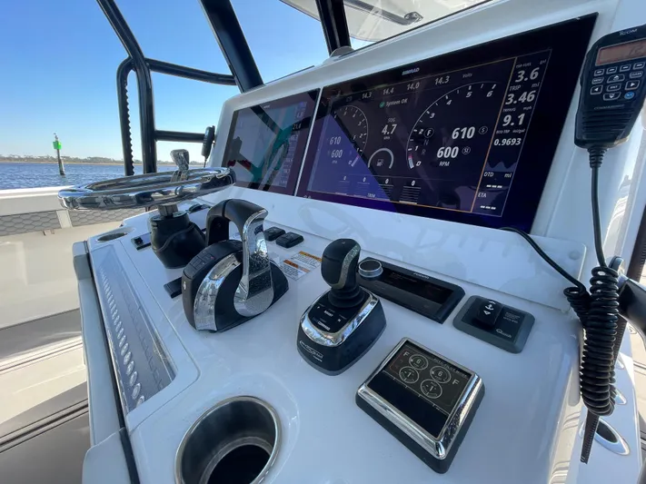  Yacht Photos Pics Control panel of 2022 Invincible 40 Catamaran with advanced navigation display and controls.