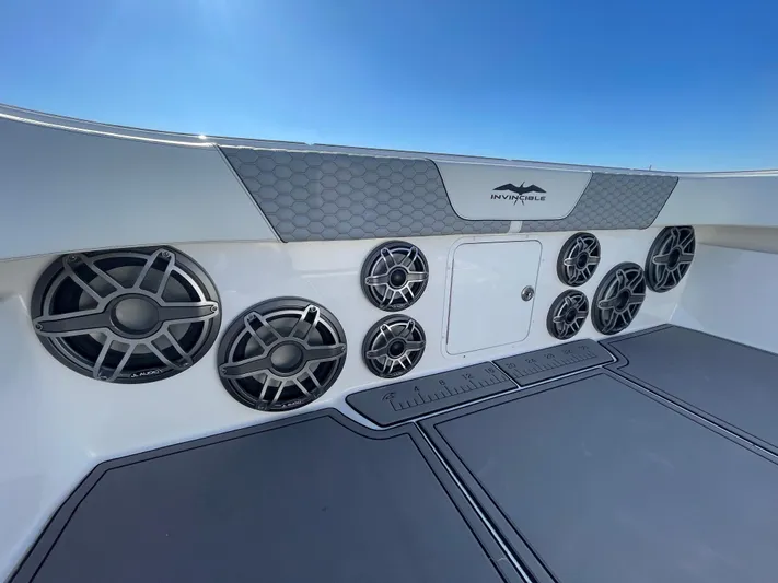  Yacht Photos Pics 2022 Invincible 40 Catamaran speakers and deck, showcasing modern marine audio system.