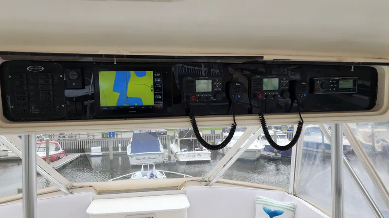 Endurance Yacht Photos Pics Control panel of a 2001 Ocean Yachts 56 Super Sport with navigation and communication equipment.