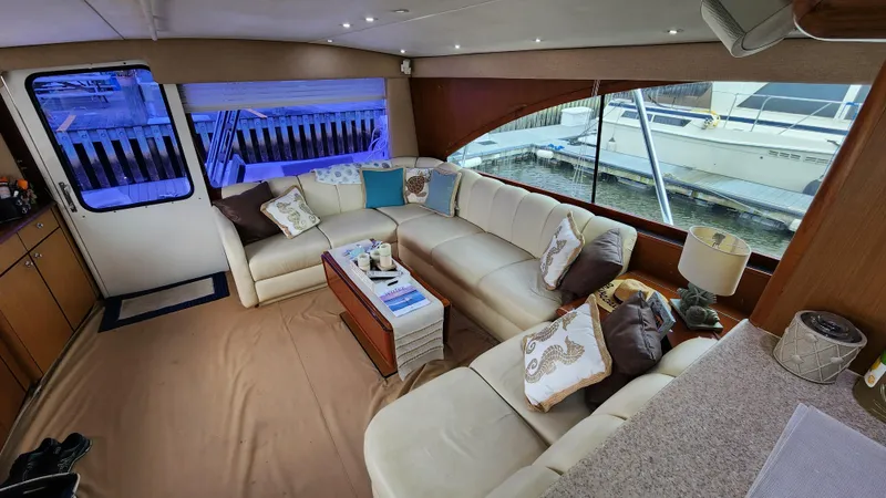 Endurance Yacht Photos Pics Luxurious interior of 2001 Ocean Yachts 56 Super Sport with plush seating and elegant decor.