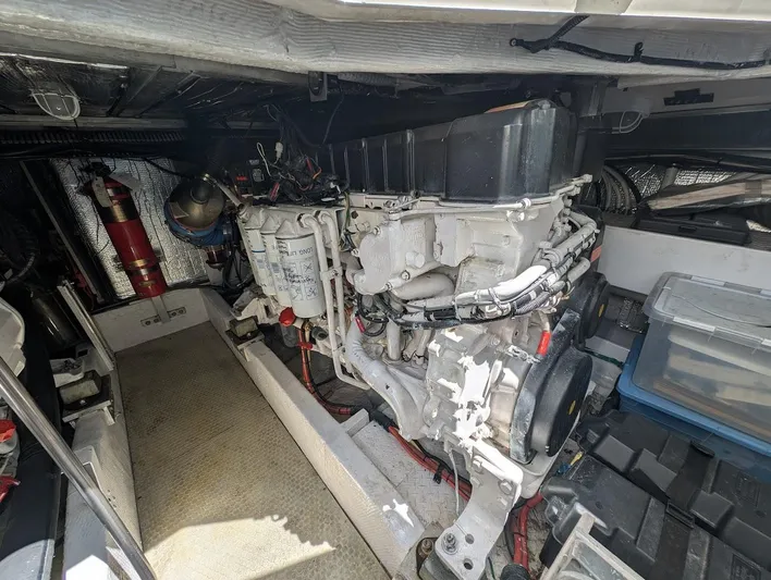 The Last Run Yacht Photos Pics Engine room of a 2003 Cruisers Yachts 5000 Sport Sedan, showcasing mechanical components.