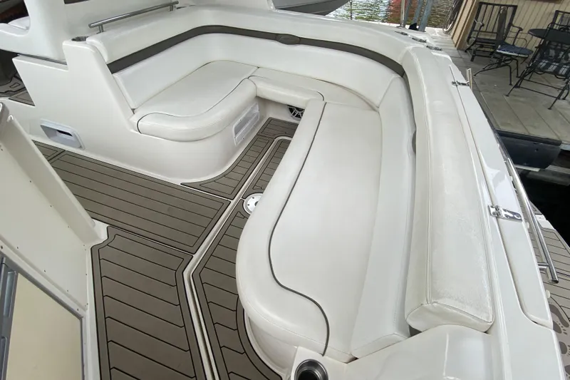  Yacht Photos Pics 2008 Rinker 350 Express Cruiser interior with white seating and teak-style flooring.