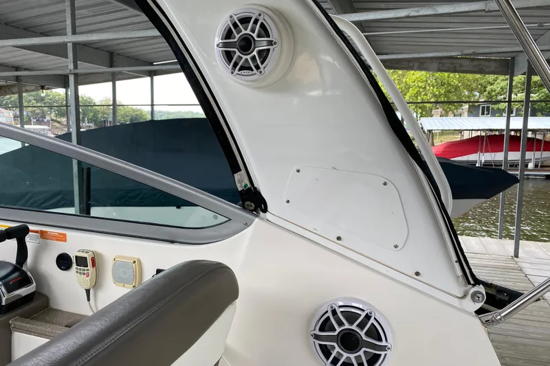  Yacht Photos Pics 2008 Rinker 350 Express Cruiser interior with speakers and control panel at dock.