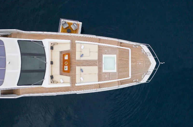 Sama Yacht Photos Pics Aerial view of 2017 Azimut Grande 35 Metri yacht with spacious deck and seating area.