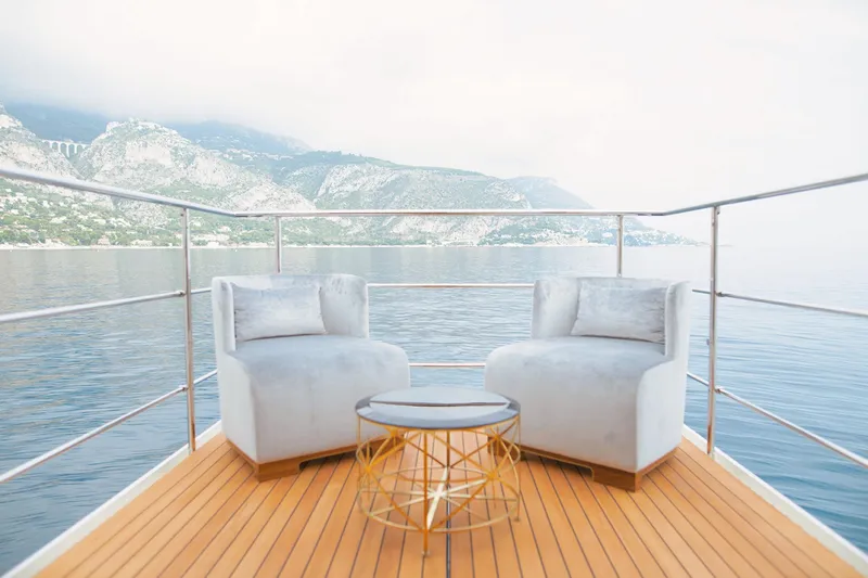 Sama Yacht Photos Pics Luxurious deck of 2017 Azimut Grande 35 Metri yacht with scenic ocean view.