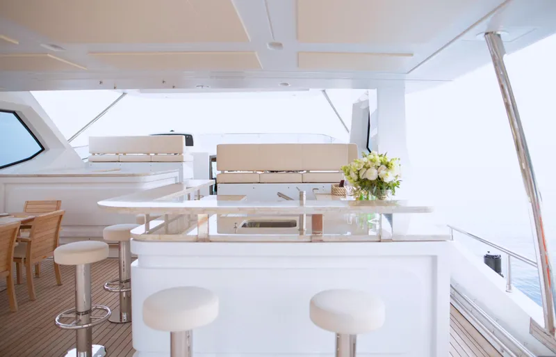 Sama Yacht Photos Pics Luxurious Azimut Grande 35 Metri yacht interior with elegant bar and seating area, 2017 model.