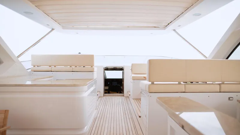 Sama Yacht Photos Pics Luxurious interior of 2017 Azimut Grande 35 Metri yacht with elegant seating and wooden flooring.