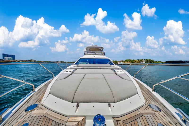  Yacht Photos Pics 2022 Azimut Fly 60 yacht on water, showcasing luxurious deck and scenic ocean view.