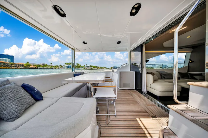  Yacht Photos Pics Luxurious 2022 Azimut Fly 60 yacht deck with elegant seating and ocean view.