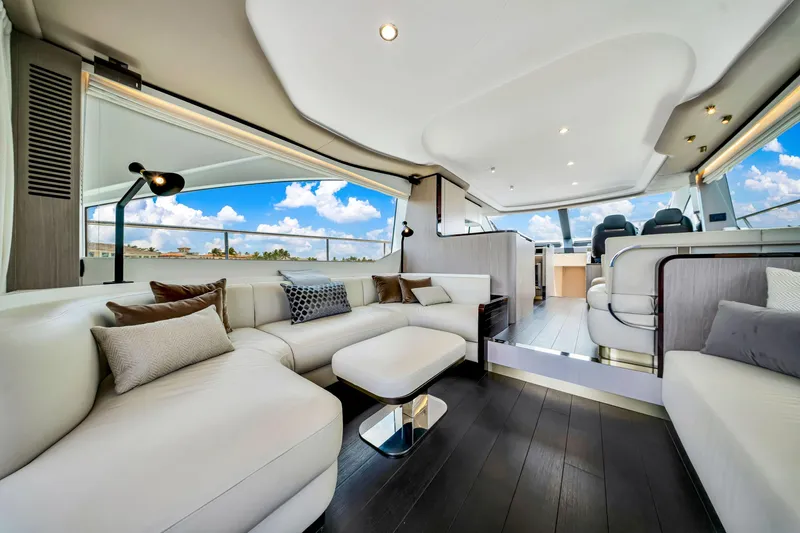  Yacht Photos Pics Luxurious interior of 2022 Azimut Fly 60 yacht with modern furnishings and panoramic windows.