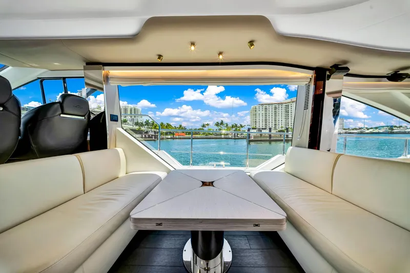  Yacht Photos Pics Luxurious interior of 2022 Azimut Fly 60 yacht with waterfront view.