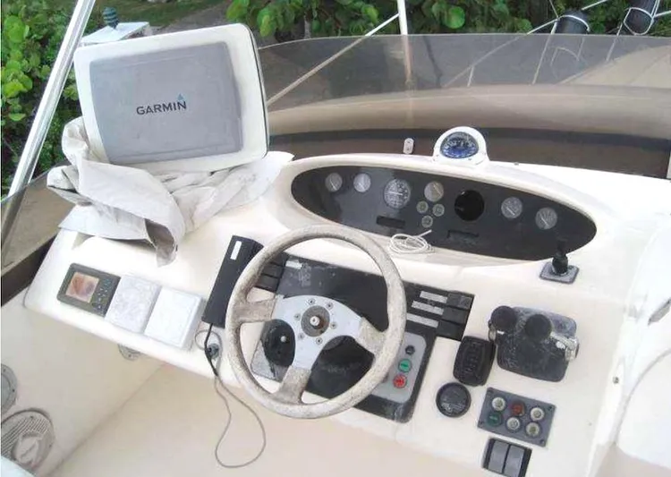  Yacht Photos Pics Control panel of a 1998 Viking Sports Cruiser with Garmin navigation system.