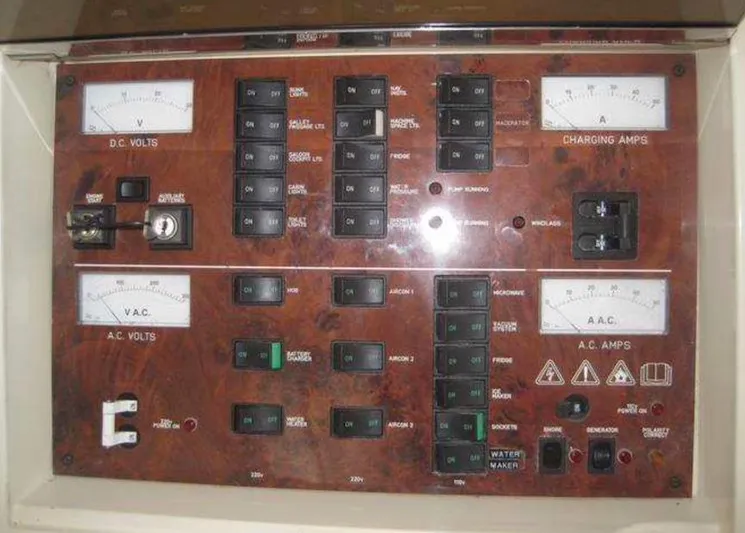  Yacht Photos Pics Control panel of a 1998 Viking Sports Cruiser, featuring voltage and amperage gauges.