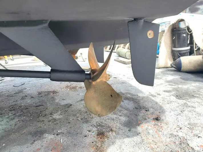 Yacht Photos Pics Propeller and rudder of a 1998 Viking Sports Cruiser on dry dock.