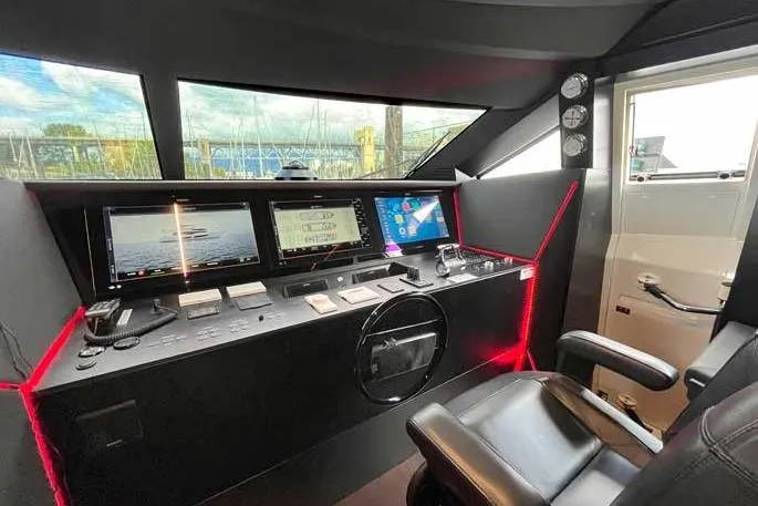  Yacht Photos Pics Control room of a 2020 Ferretti Yachts 850 with modern navigation equipment.